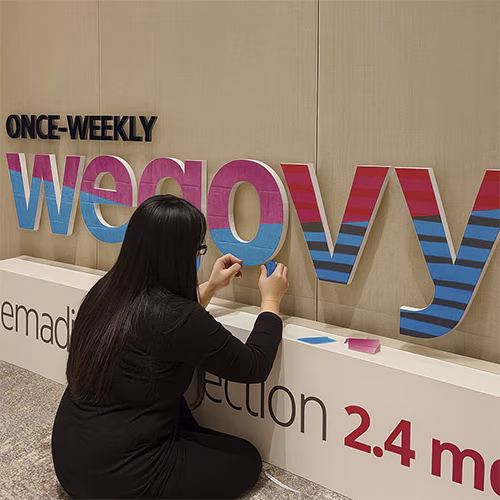 3D selfie sculpture mosaic display at a corporate event in Dubai with guest photos forming a 360-degree interactive art installation