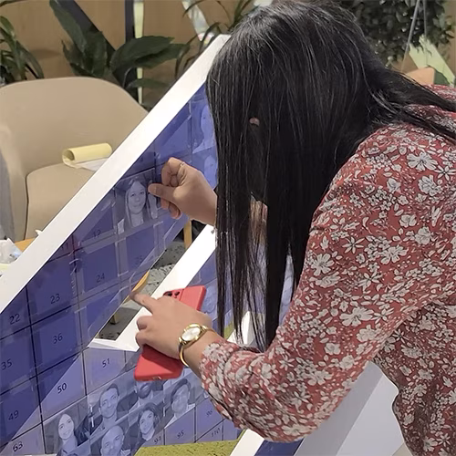 3D selfie sculpture mosaic display at a corporate event in Dubai with guest photos forming a 360-degree interactive art installation