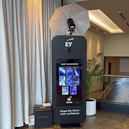 Guests enjoying an AI-powered photo booth with instant background removal and immersive virtual scenes—no green screen required.
