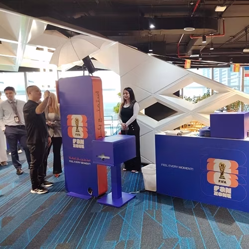 AI Trading Cards Photo Booth activation, printing custom personalized collectible cards for guests at a corporate event in Dubai