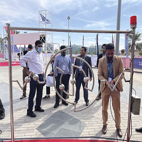 Giant Buzz Wire rental in Dubai with custom branding and wire shape for corporate events, brand activations, and carnival games in the UAE