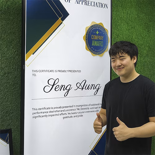 Calligraphy-style certificate printing setup at Dubai event