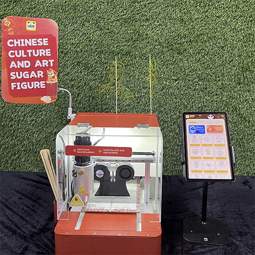 Guests using the AI Sugar Painting Robot in UAE, watching it create edible art and enjoying unique designs at events, kids activities, and parties.