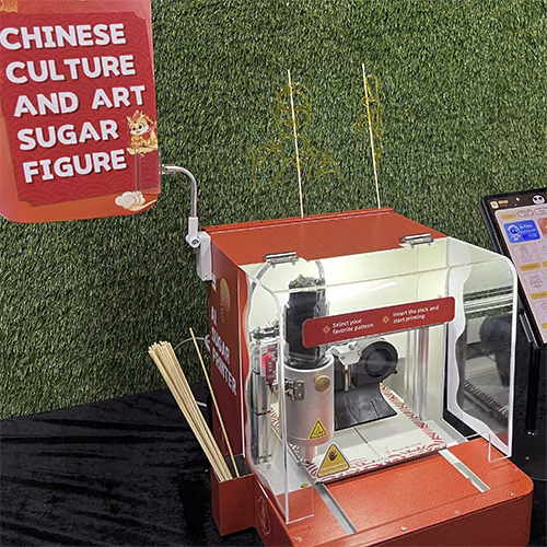 Guests using the AI Sugar Painting Robot in UAE, watching it create edible art and enjoying unique designs at events, kids activities, and parties.