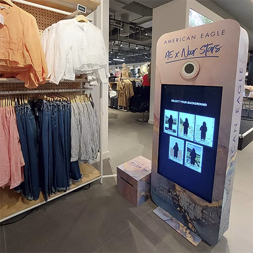 Guests enjoying an AI-powered photo booth with instant background removal and immersive virtual scenes—no green screen required.
