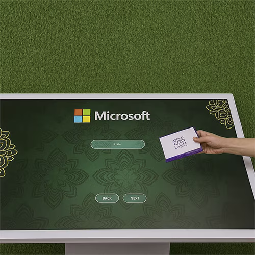 Guest receiving printed Arabic calligraphy artwork at a live event in Dubai, showcasing AI-powered personalized calligraphy in an elegant cultural setting.