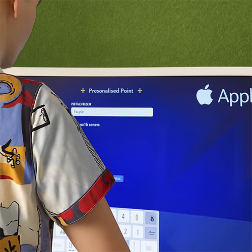 Young Emirati guest using AI Poem Generator kiosk in Dubai, creating personalized Arabic or English poem with instant printout and event branding