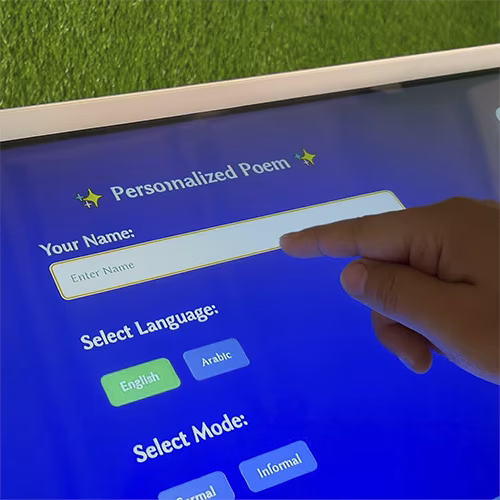Young Emirati guest using AI Poem Generator kiosk in Dubai, creating personalized Arabic or English poem with instant printout and event branding
