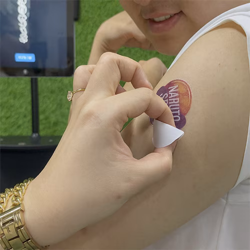Guests creating their own AI Tattoos at exhibition in Dubai