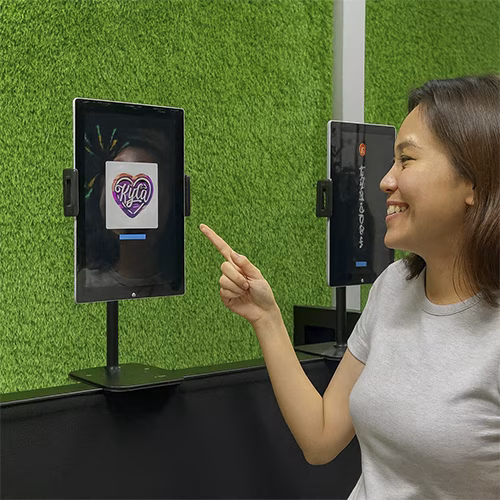 Guests creating their own AI Tattoos at exhibition in Dubai