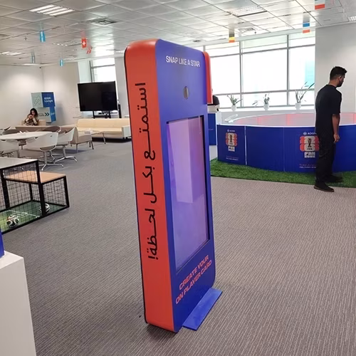 AI Trading Cards Photo Booth activation, printing custom personalized collectible cards for guests at a corporate event in Dubai