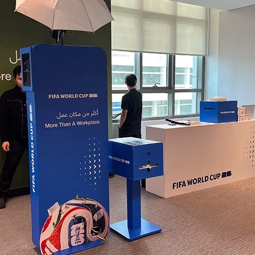 AI Trading Cards Photo Booth activation, printing custom personalized collectible cards for guests at a corporate event in Dubai