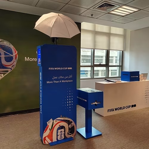 AI Trading Cards Photo Booth activation, printing custom personalized collectible cards for guests at a corporate event in Dubai