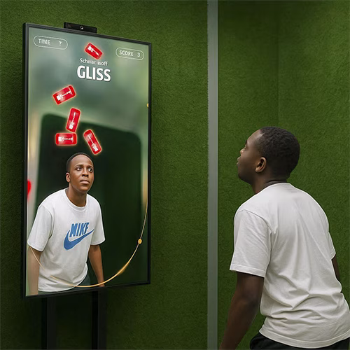 Guest playing interactive balance game using motion sensors to stack virtual items on head at a corporate event or exhibition booth in Dubai – fun and engaging activity.
