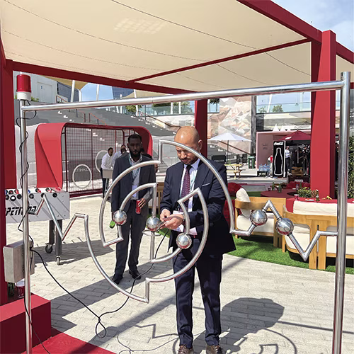 Giant Buzz Wire rental in Dubai with custom branding and wire shape for corporate events, brand activations, and carnival games in the UAE