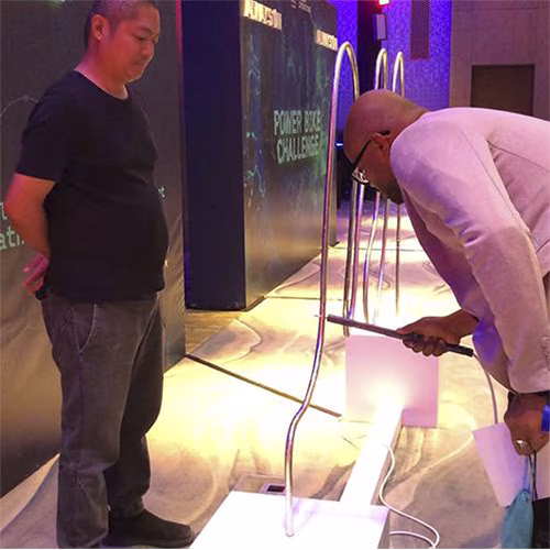 Giant Buzz Wire rental in Dubai with custom branding and wire shape for corporate events, brand activations, and carnival games in the UAE