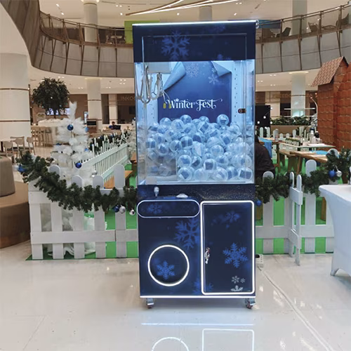 EXPLORE CLAW MACHINE FROM MIRROR BOOTH EVENT SERVICES L.L.C, PROVIDING TOP EVENT SERVICES IN DUBAI.