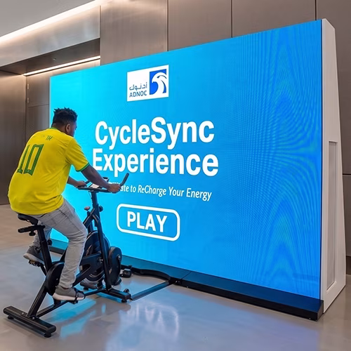 Interactive cycle simulator rental for corporate events and trade shows in Dubai by Mirror Booth Dubai