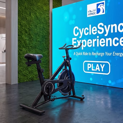 Interactive cycle simulator rental for corporate events and trade shows in Dubai by Mirror Booth Dubai