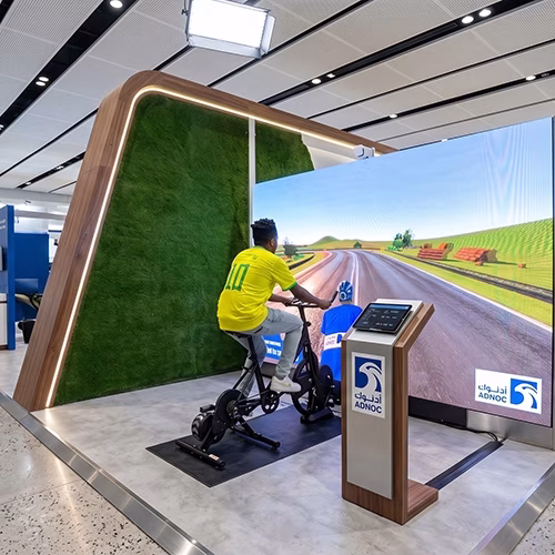 Interactive cycle simulator rental for corporate events and trade shows in Dubai by Mirror Booth Dubai