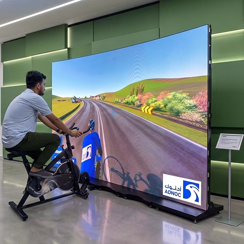 Interactive cycle simulator rental for corporate events and trade shows in Dubai by Mirror Booth Dubai
