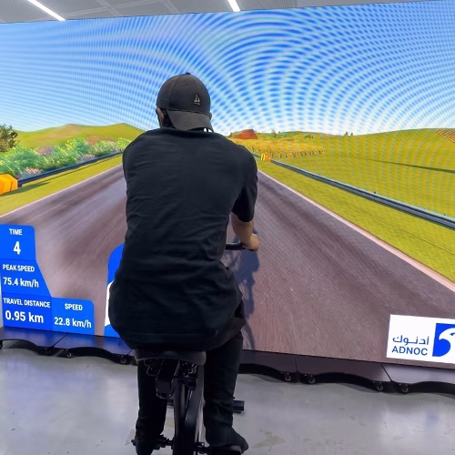 Interactive cycle simulator rental for corporate events and trade shows in Dubai by Mirror Booth Dubai