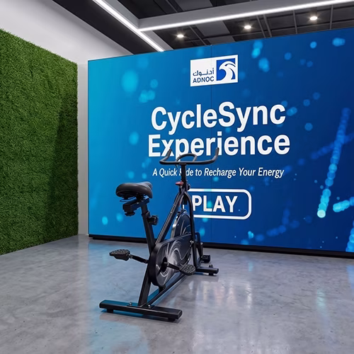 Interactive cycle simulator rental for corporate events and trade shows in Dubai by Mirror Booth Dubai