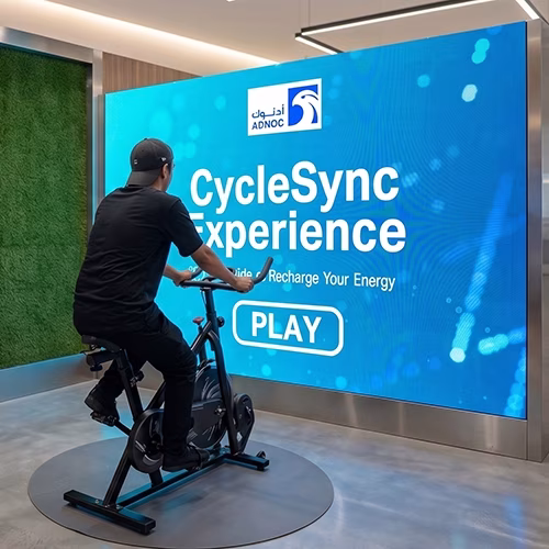 Interactive cycle simulator rental for corporate events and trade shows in Dubai by Mirror Booth Dubai