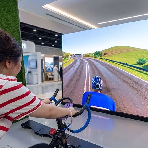 Interactive cycle simulator rental for corporate events and trade shows in Dubai by Mirror Booth Dubai