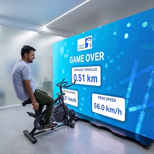 Interactive cycle simulator rental for corporate events and trade shows in Dubai by Mirror Booth Dubai