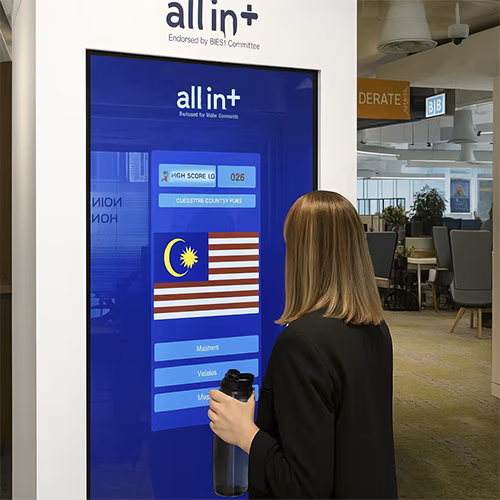 Participants playing the interactive Guess the Flag game at an event, engaging with a fun, branded quiz experience that tests geographical knowledge in a lively setting.