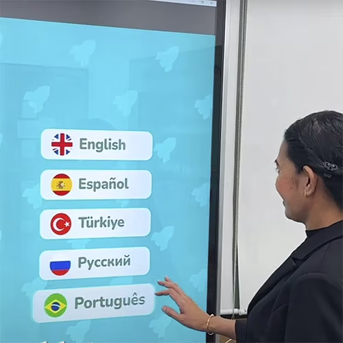 Participants playing the interactive Guess the Flag game at an event, engaging with a fun, branded quiz experience that tests geographical knowledge in a lively setting.