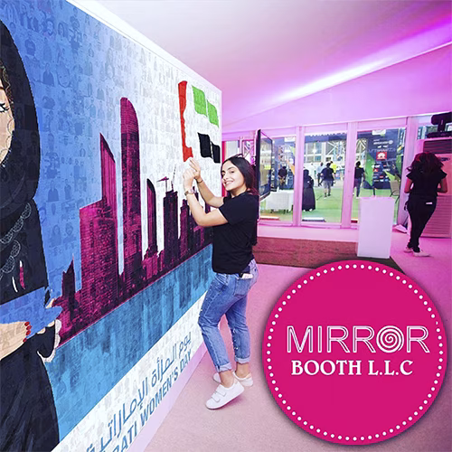 Guests adding photos to a digital mosaic wall, creating a collaborative image masterpiece at a live event.