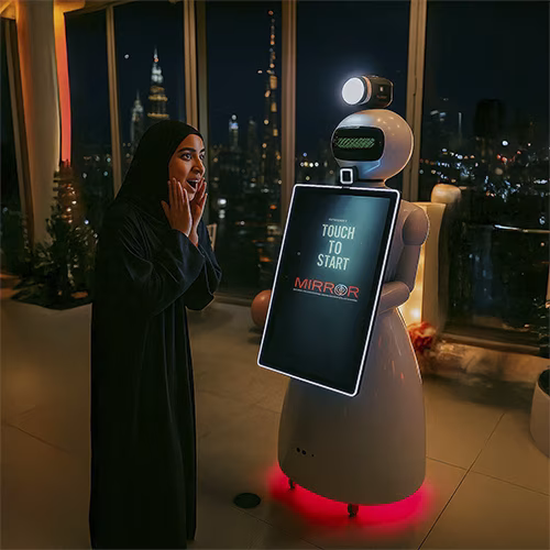 AI Robot Photo Booth at Dubai exhibition capturing branded, AI-enhanced photos for corporate event attendees in a vibrant, tech-driven setting