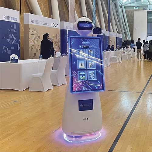AI Robot Photo Booth at Dubai exhibition capturing branded, AI-enhanced photos for corporate event attendees in a vibrant, tech-driven setting