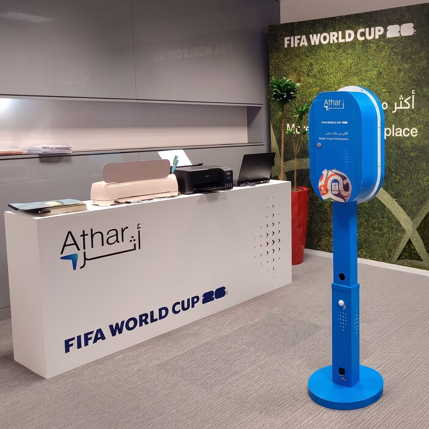 Guest holding a custom-printed sheet of branded AI branded stickers at a Dubai corporate event