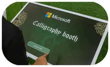 Guest receiving printed Arabic calligraphy artwork at a live event in Dubai, showcasing AI-powered personalized calligraphy in an elegant cultural setting.